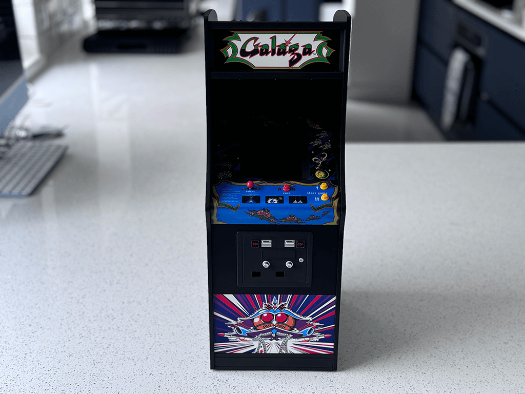 A Galaga Quarter Arcade front view showing the orginal Galaga ROM playing from a distance.