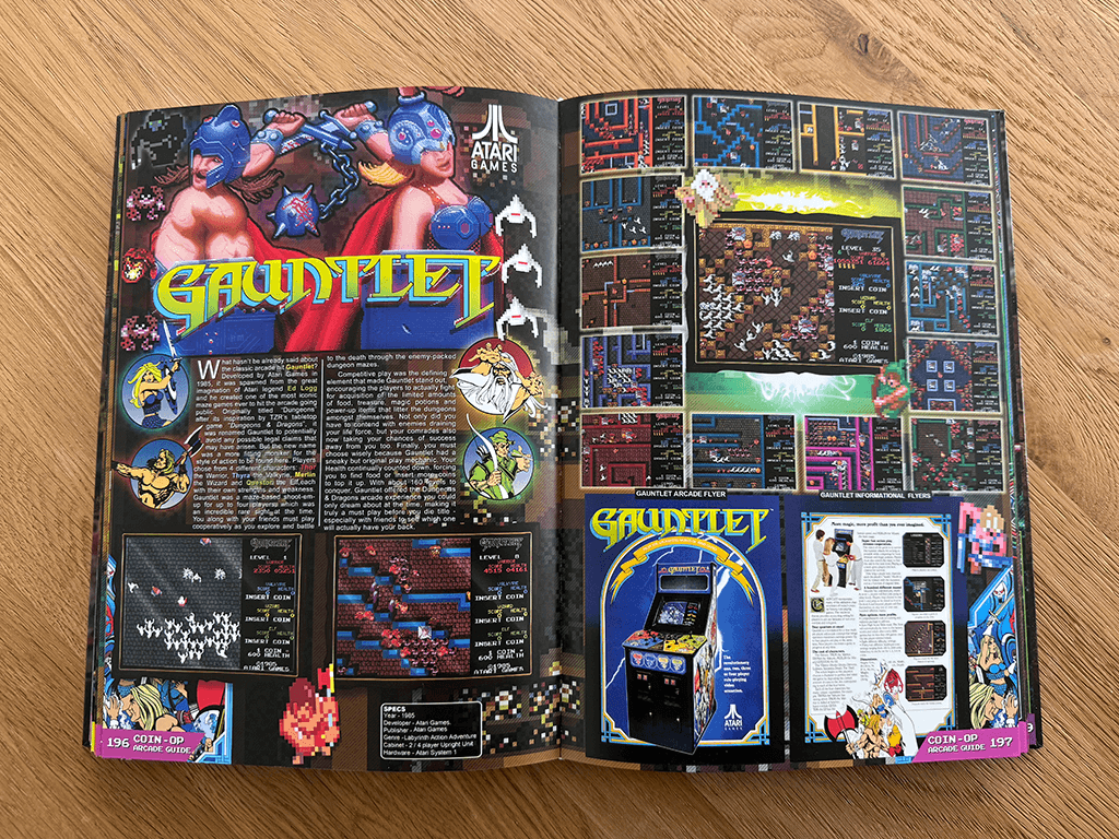 An open 'Coin-Op: The Arcade Guide' book which shows information about the Gauntlet games.